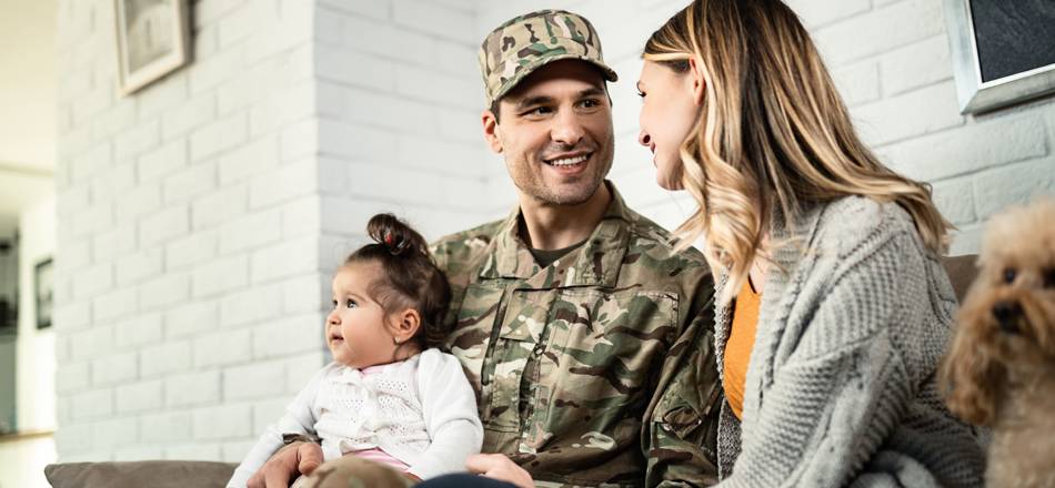 Small military family with baby and puppy