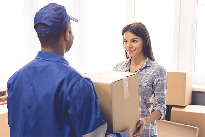 a box being delivered to a lady