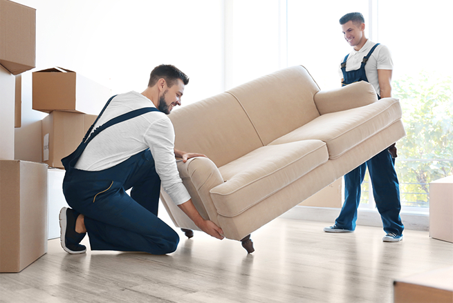 workers moving the couch