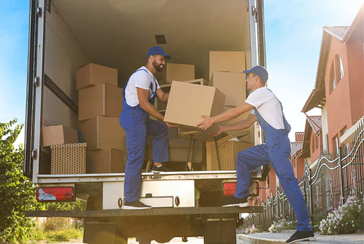 two movers helping the boxes move