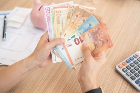 women counting euro money banknote. concept of home finance, personal loan,insurance claim.