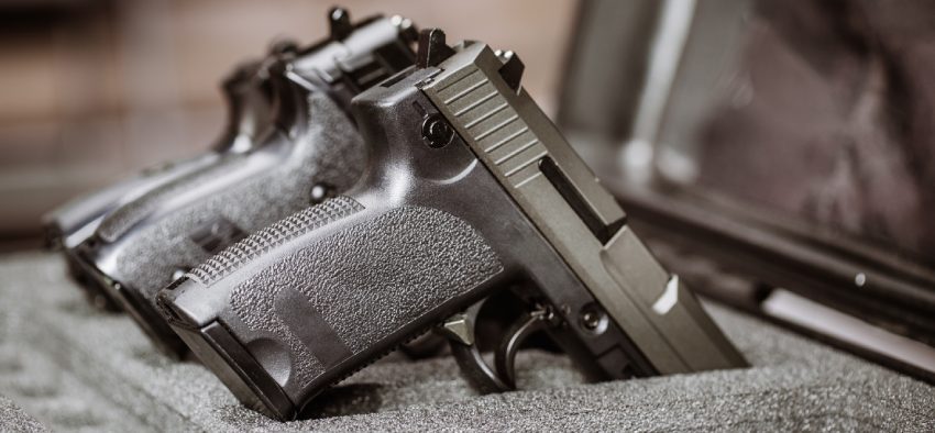 black handgun in plastic Secure Storage Case