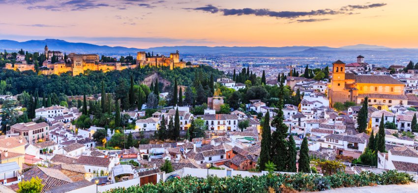 Alhambra of Granada, Spain. Alhambra fortress and Albaicin quarter at twilight.