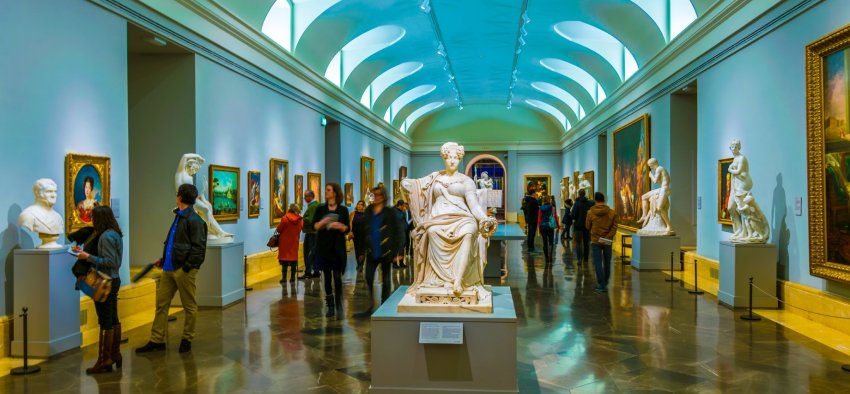 MADRID, SPAIN, JANUARY 9, 2016: People are strolling through corridors of the prado gallery and enjoying view of painting masterpieces