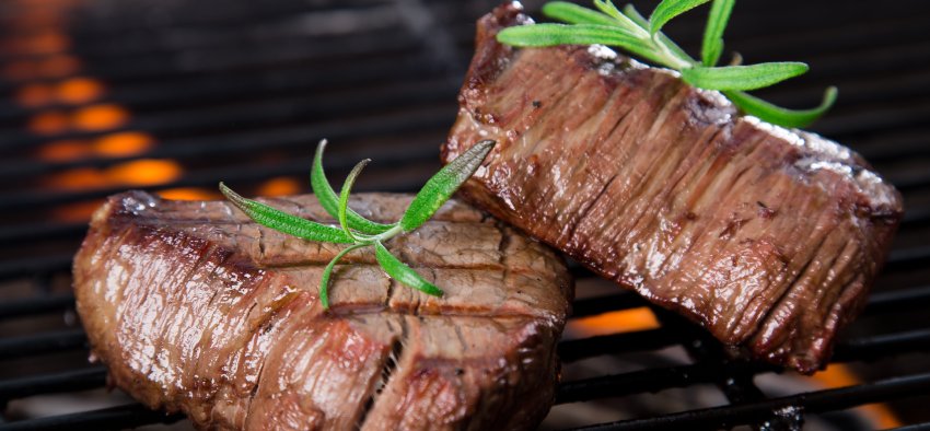 closeup of steak on a grill