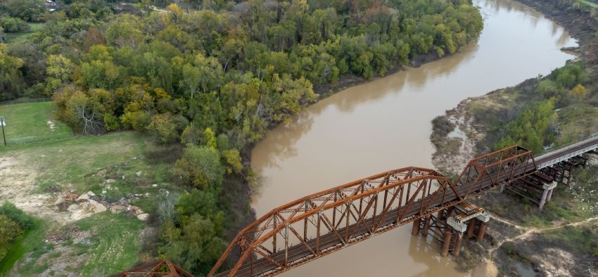 Railroad bridge over the Brazos River in Richmond, Texas.