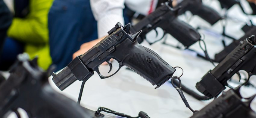 Gun Display Stands. Pistols for sale in the store.